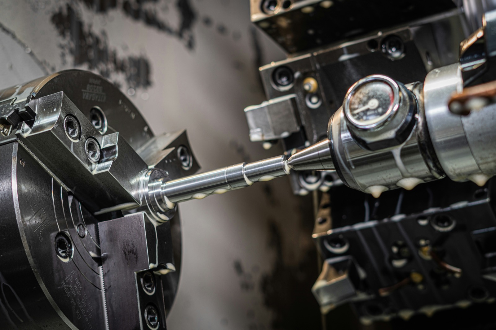 CNC machining center cutting precision die components from tool steel block