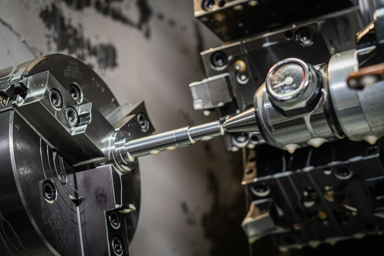 CNC machining center cutting precision die components from tool steel block