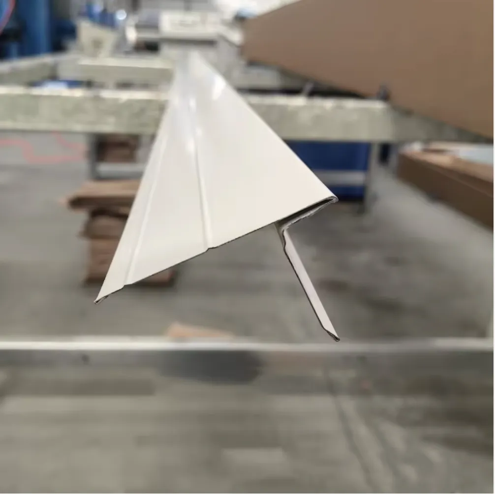 Stacked formed drip edge pieces bundled on a table in the shop